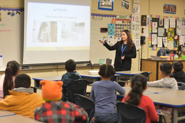 Stephanie Sandoval presenting to youth on health education