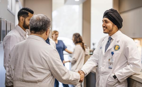 Students meeting with doctor